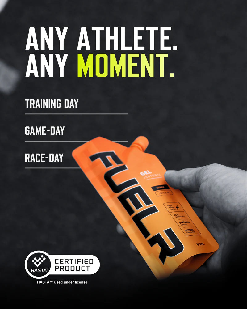 Orange FUELr supplement pouch held by a hand with promotional text on a dark background