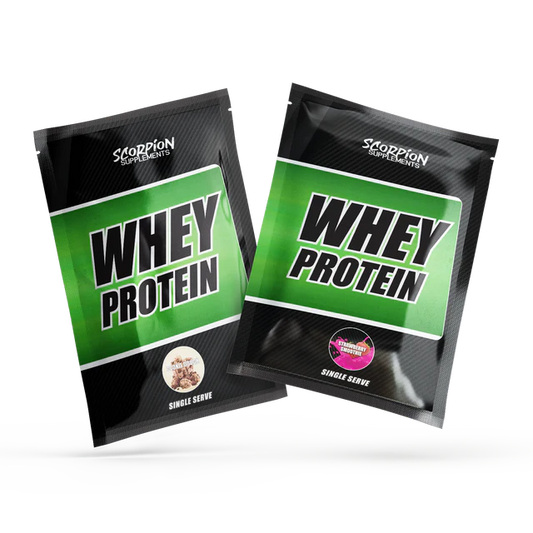 Two Scorpion Supplements whey protein packets on a white background